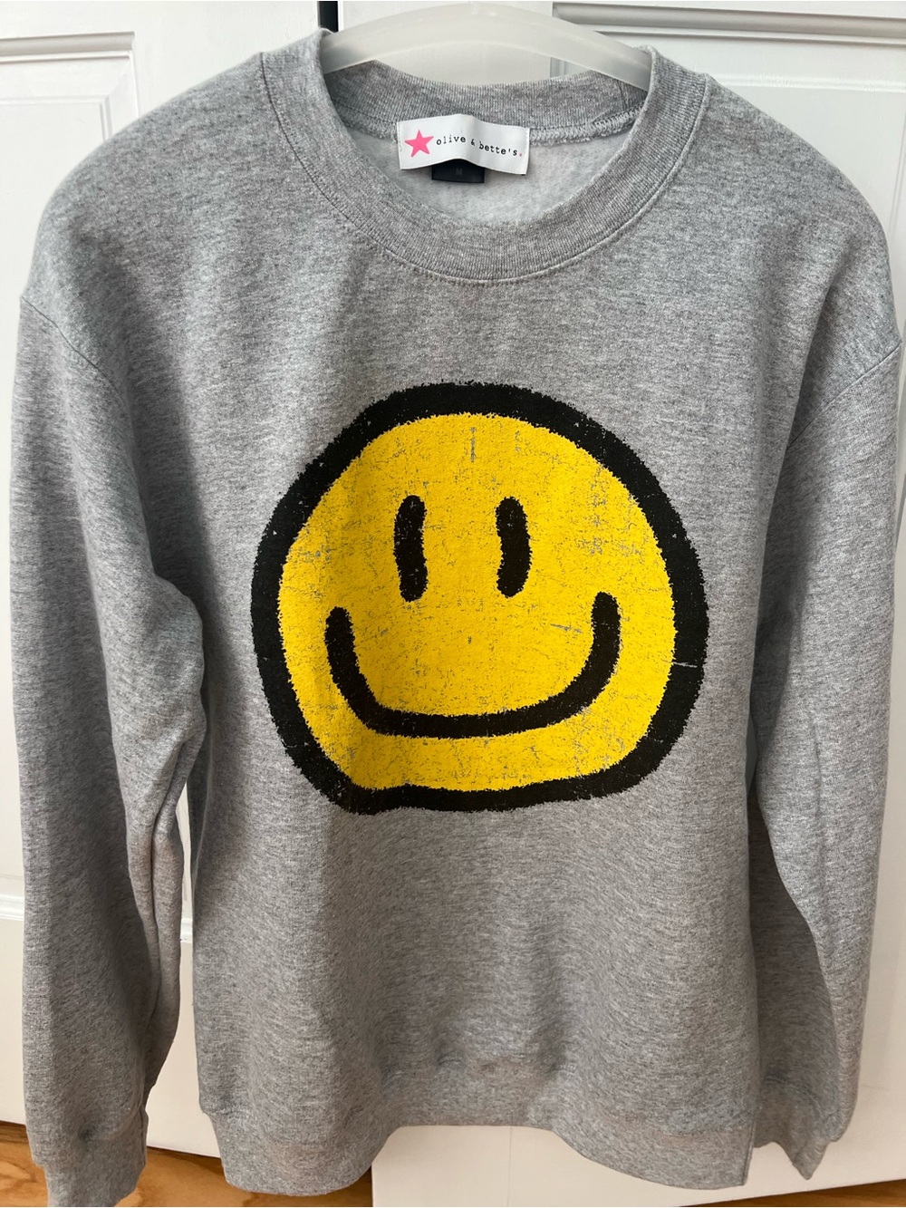Olive & Bette’s Boutique- Smiley Face Sweatshirt- Women’s Medium